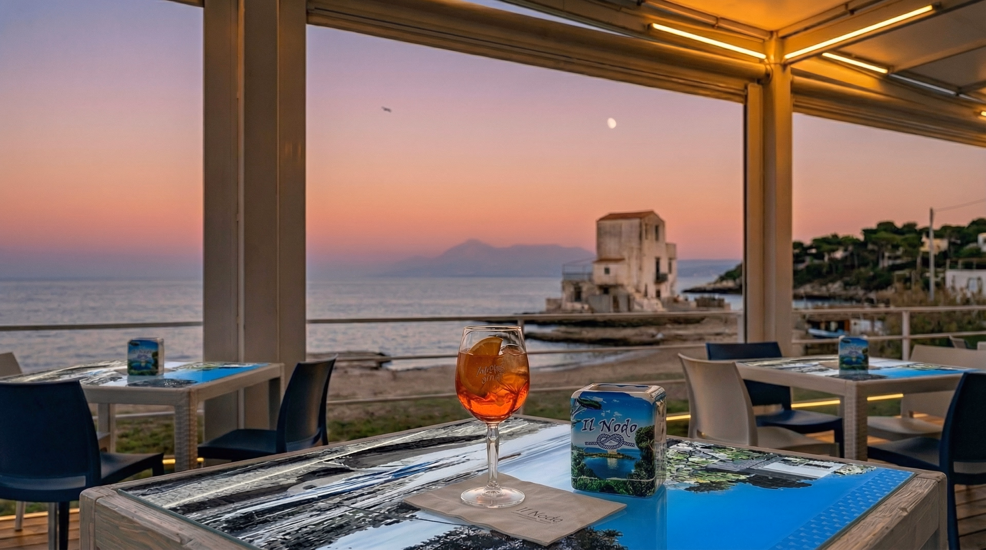 Vista panoramica Il Nodo Beach Bar al tramonto
